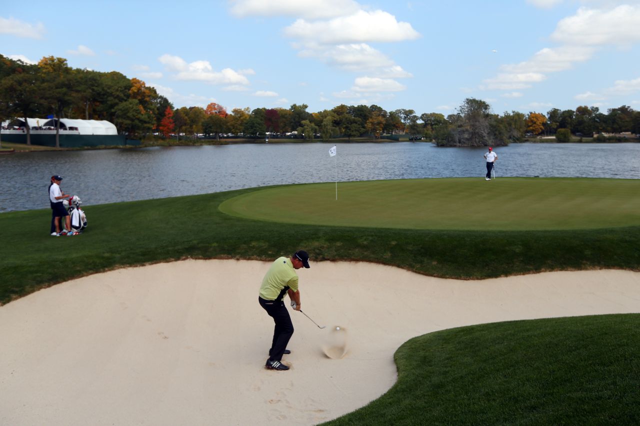 Peter Hanson of Europe plays a bunker shot on the second hole during the afternoon four-ball matches on Friday.
