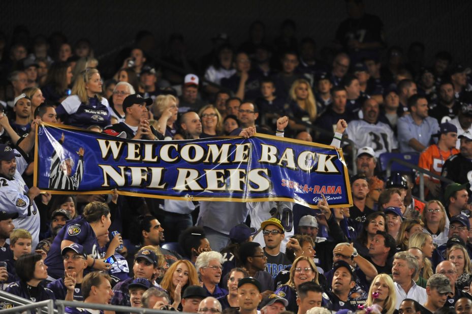 Ravens fans cheer the return of regular referees at M&T Bank Stadium in Baltimore.