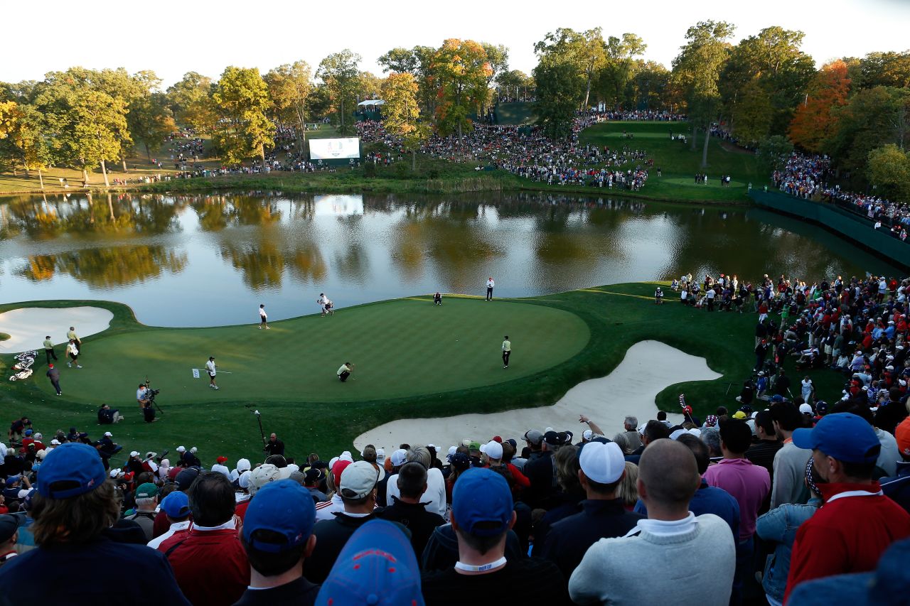 Fans watch the play on the 17th hole on Friday.