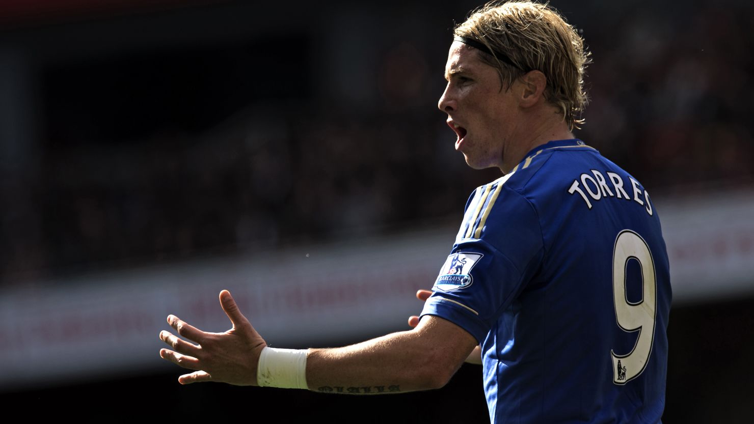 Fernando Torres celebrates scoring the opening goal for Cheslea in a 2-1 over Arsenal at the Emirates Stadium on Saturday. 