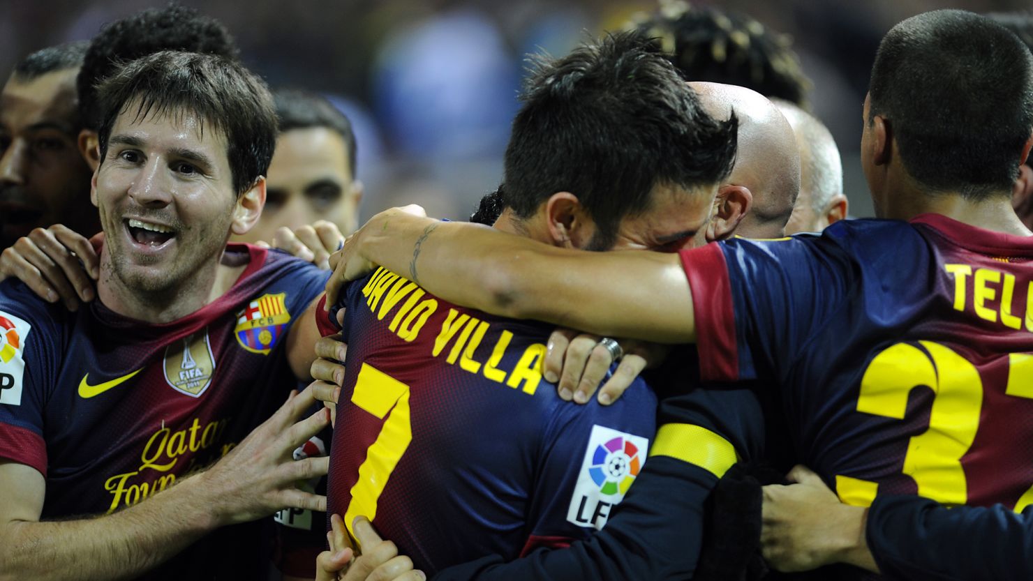 David Villa is congratulated by his teammates after scoring a dramatic late winner against Sevilla on Saturday.