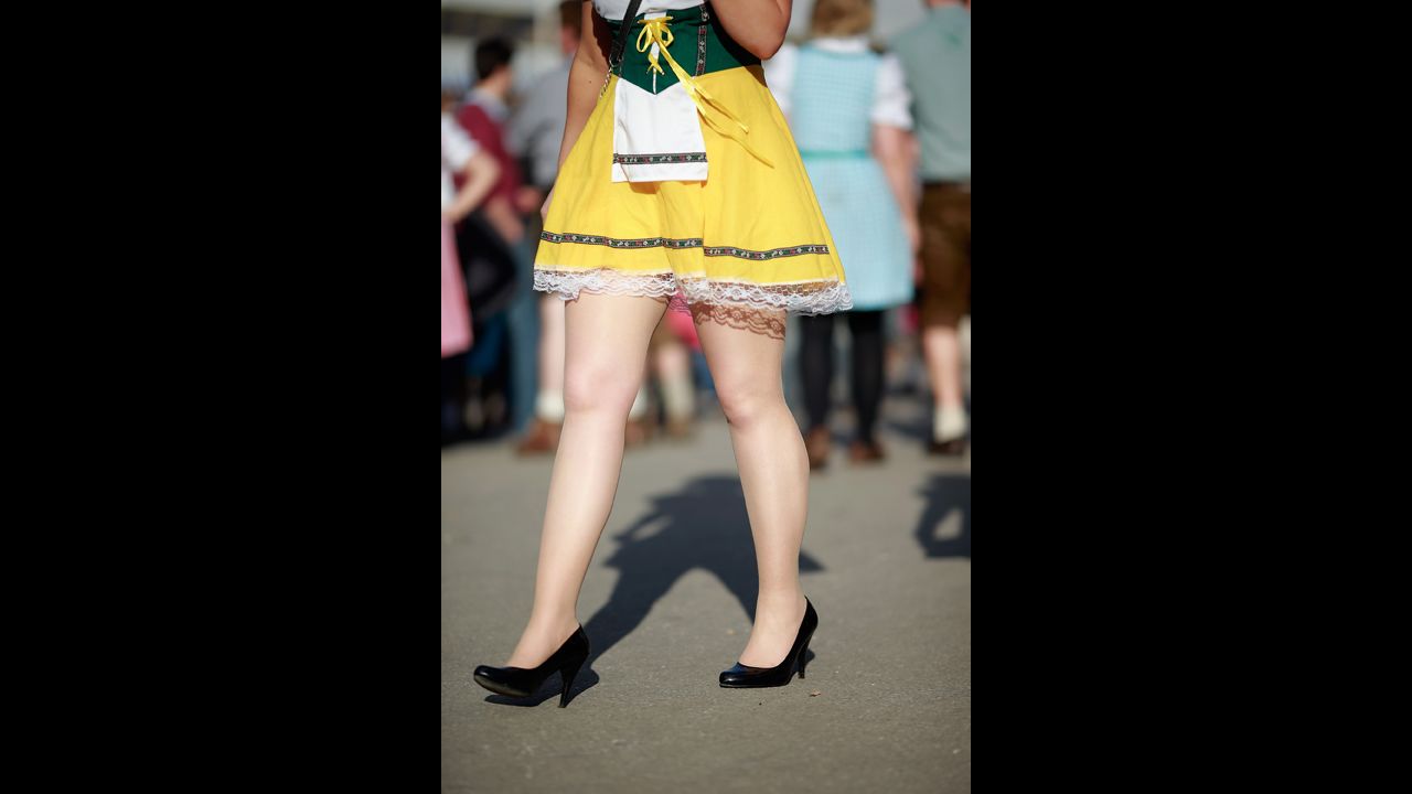 A woman dressed in traditional Bavarian clothing attends day seven of Oktoberfest on Friday.