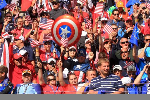 Team USA fans cheer from the stands Sunday.