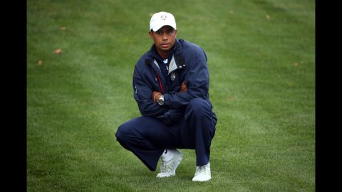 Tiger Woods of the United States watches from the fairway on the first hole Sunday.