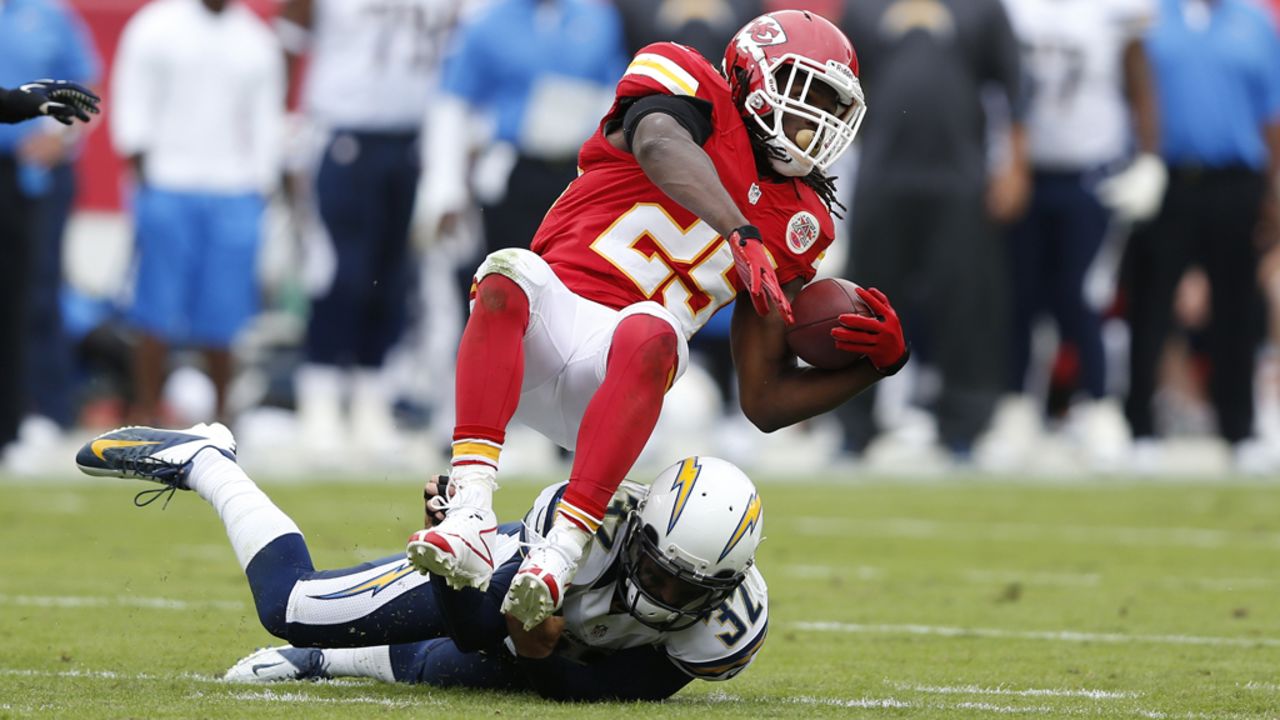 Jamaal Charles of the Kansas City Chiefs gets tackled by Eric Weddle of the San Diego Chargers on Sunday.