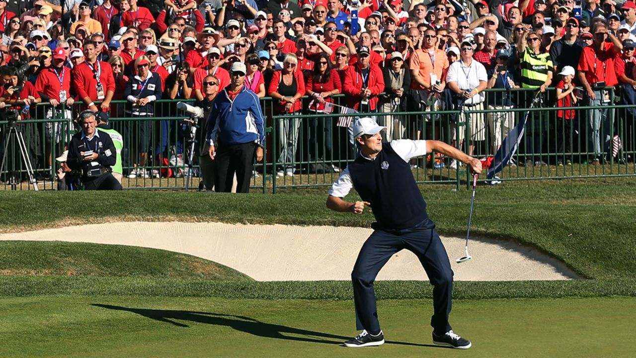 Justin Rose of Europe celebrates a birdie putt on the 18th green to defeat Phil Mickelson on Sunday.
