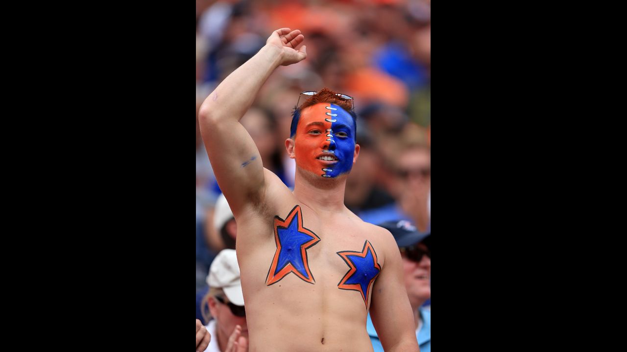A fan cheers on the Denver Broncos on Sunday.