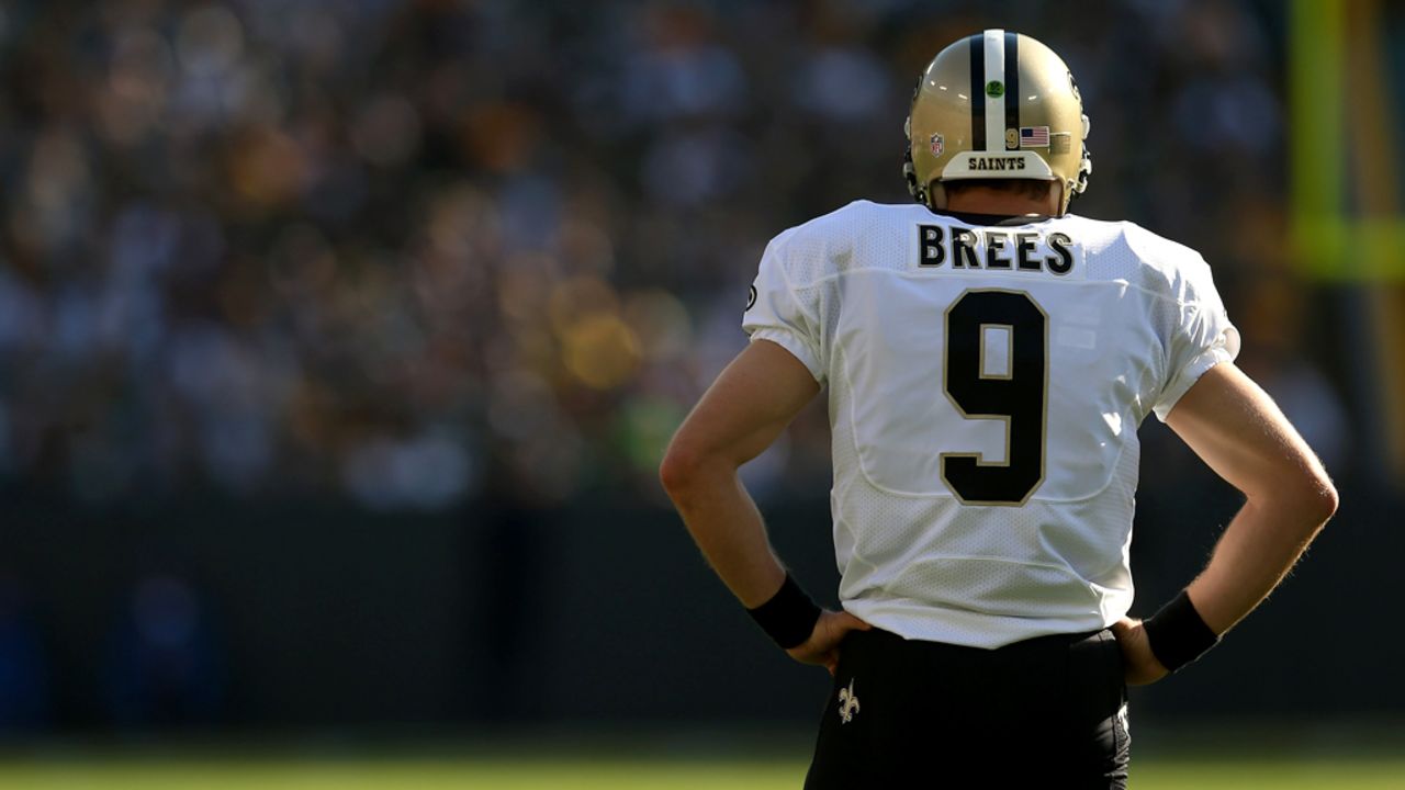 Quarterback Drew Brees of the New Orleans Saints awaits the start of play against the Green Bay Packers on Sunday.