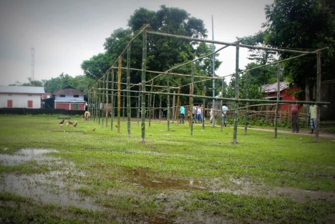Unsure when residents will be able to return home, some schools have improvised alternative structures so classes can resume. This bamboo frame will become a primary school for hundreds of students when the seasonal rains stop and the ground dries enough that children can sit on it. 