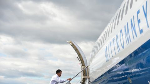 Romney boards his campaign plane in Bedford, Massachusetts, on Monday, October 1. The Republican candidate was heading to Denver for the first presidential debate on Wednesday.