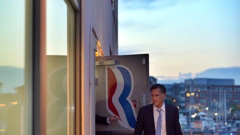 Romney leaves his campaign headquarters in Boston on Sunday.