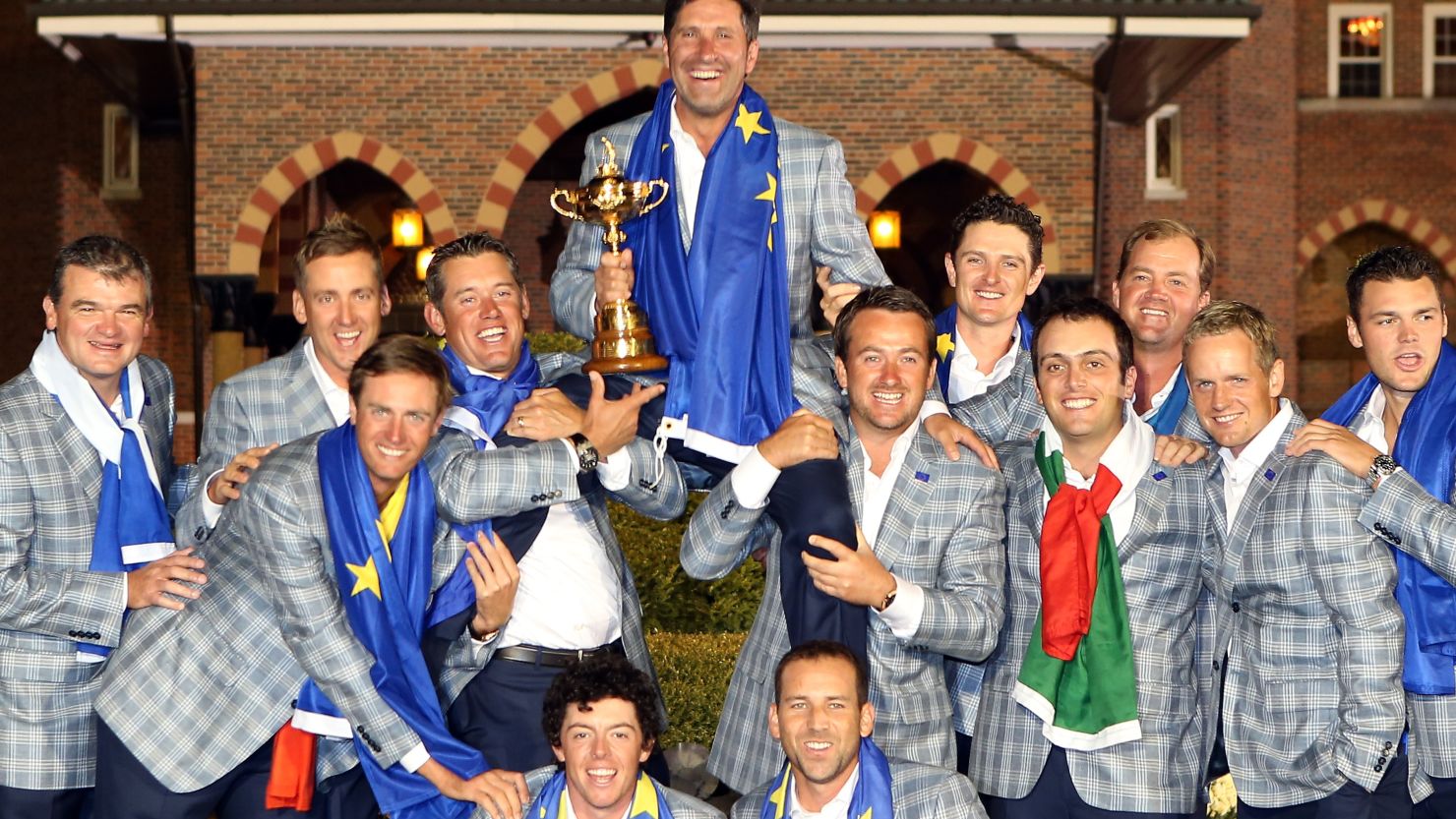 Europe's jubilant players lift their victorious Ryder Cup captain Jose Maria Olazabal in the air after winning in Chicago.