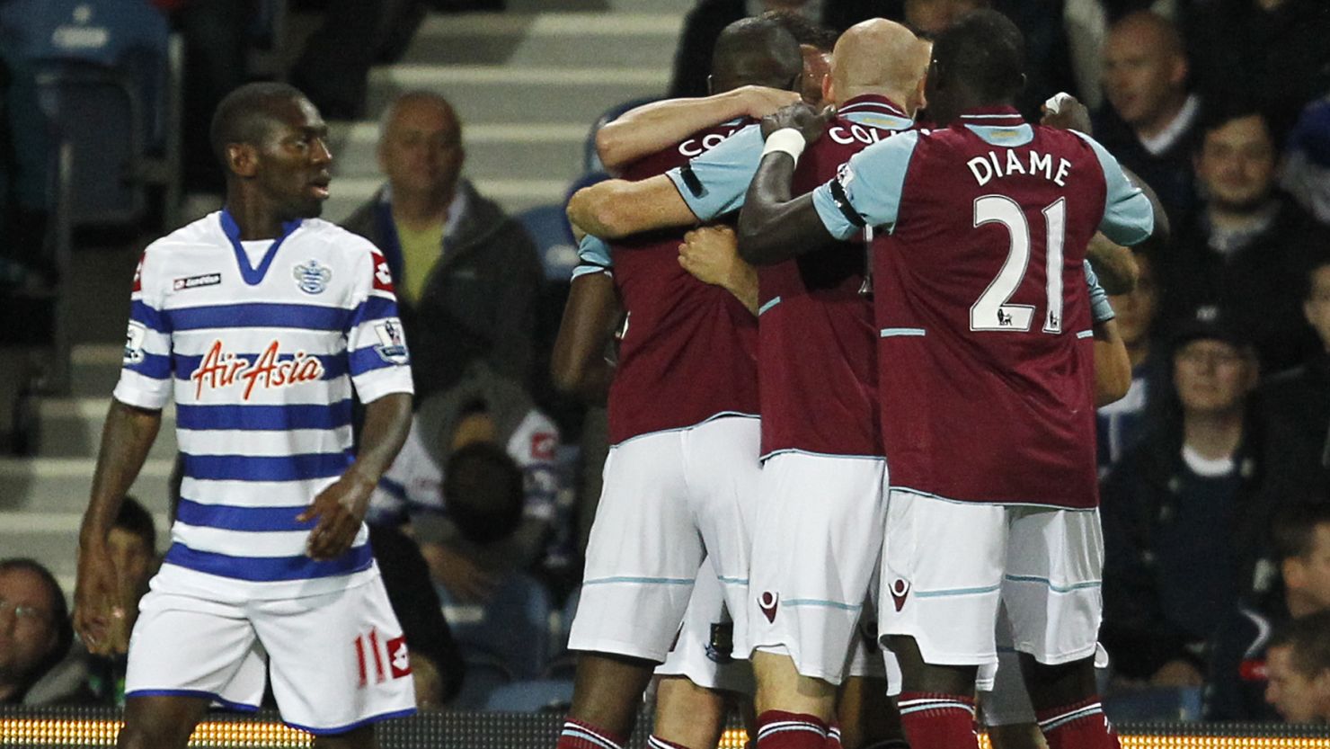 West Ham's Ricardo Vaz Te is mobbed by his teammates after scoring their second against Queen's Park Rangers