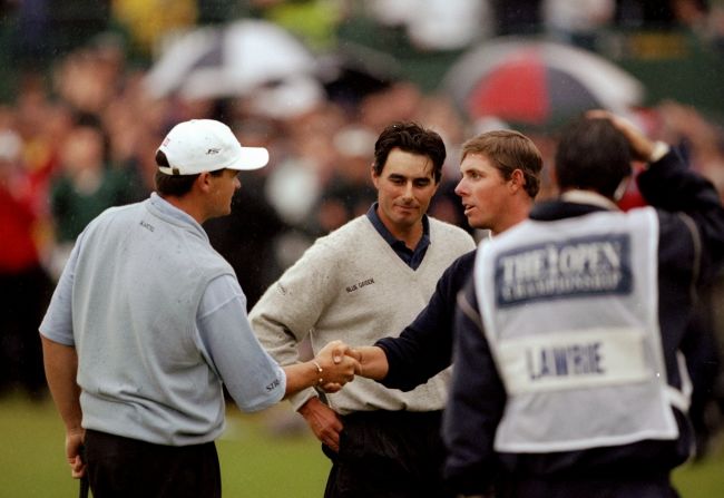 Jean Van de Velde (middle) looks bewildered as he reflects on his defeat in the 1999 British Open. The Frenchman blew a three-shot lead on the final hole, so forcing a play-off with Justin Leonard (right) and Scotland's Paul Lawrie (left) which the latter won to seal his first major, despite trailing Van de Velde by an enormous 10 strokes before the final round took place. 