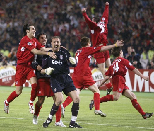 Liverpool players celebrate with goalkeeper Jerzy Dudek (in black) after the English side completed their remarkable comeback against Italians AC Milan in the 2005 European Champions League final. Trailing 3-0 at half time, Liverpool scored three goals in six second half minutes in Istanbul to force extra time and a penalty shoot-out, which they won 3-2. 