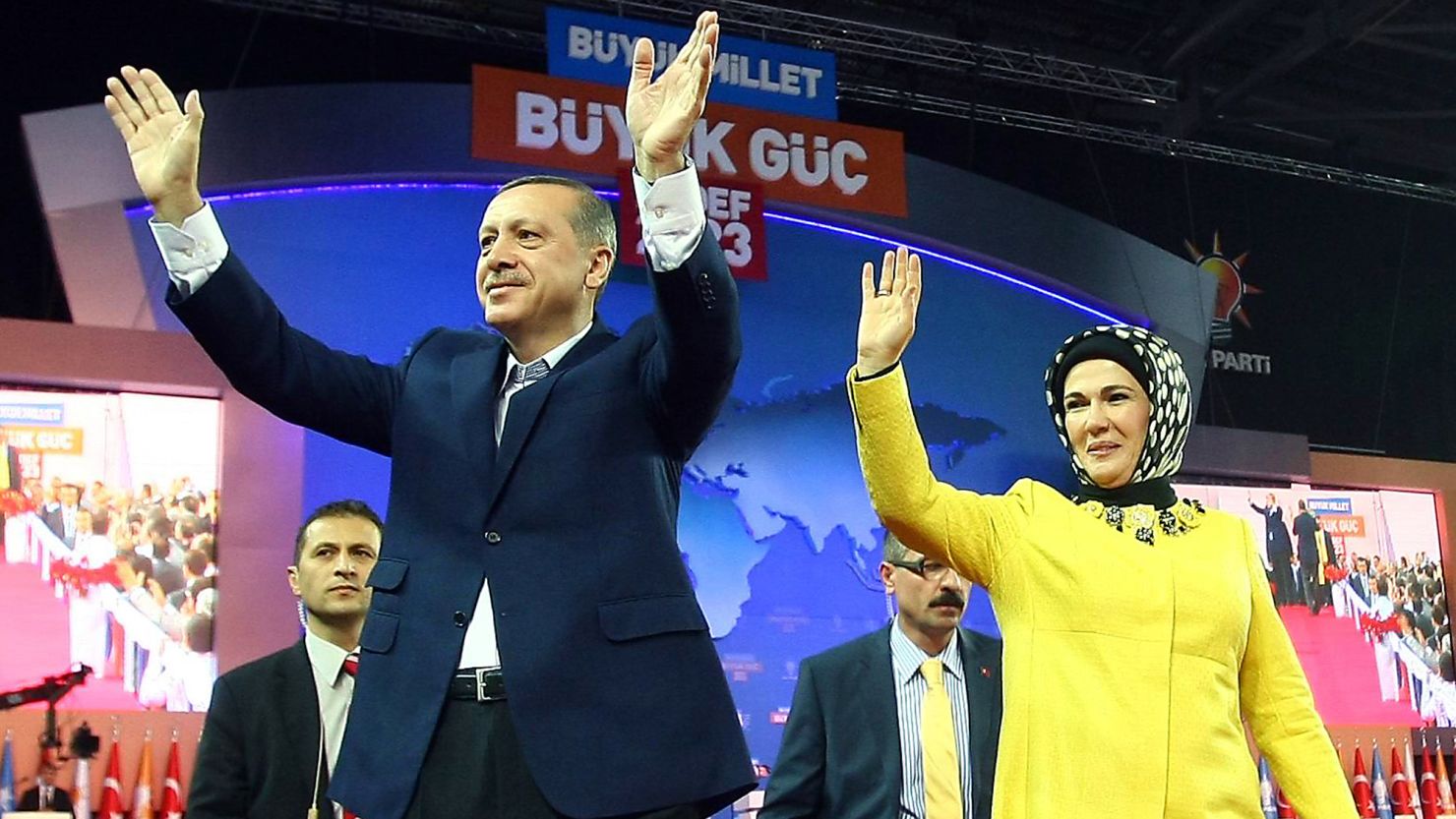  Turkish Prime Minister Recep Tayyip Erdogan and his wife Emine salute the audience during a congress of his party on Sunday.