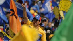 Venezuelan opposition presidential candidate Henrique Capriles arrives to a campaign rally in Caracas, on September 30, 2012.