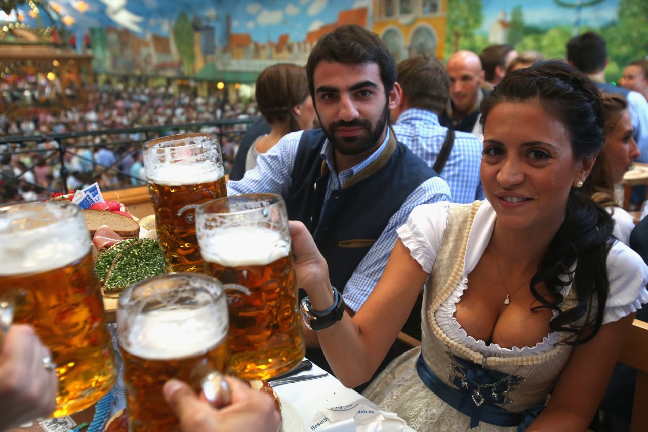 Grigoris Makos of the football team TSV 1860 Munich and his wife, Athena, enjoy some suds Tuesday.