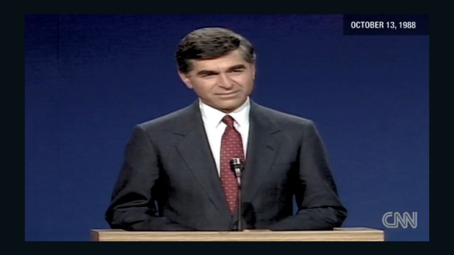 Michael Dukakis at a 1988 presidential debate. Vice President Bush used Dukakis' record against him, Julian Zelizer says.