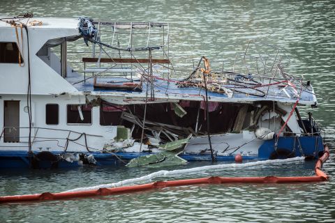 The damaged Lamma IV passenger boat sits offshore on Wednesday.