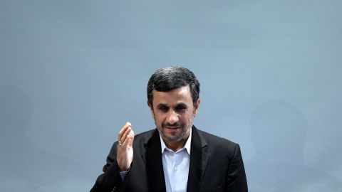 Iranian President Mahmoud Ahmadinejad waves during a press conference in Tehran on October 2, 2012.