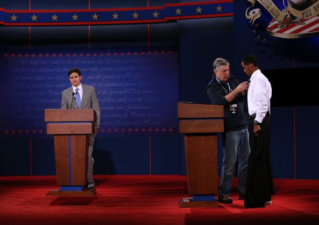 Gonzales, left, and Mohamed stand in for Romney and Obama on Tuesday.
