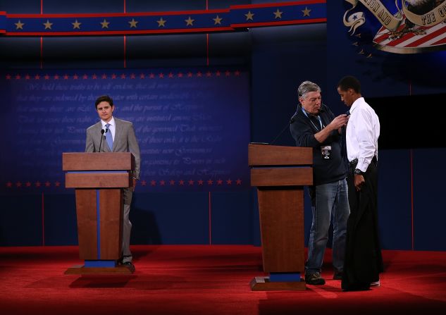 Gonzales, left, and Mohamed stand in for Romney and Obama on Tuesday. 