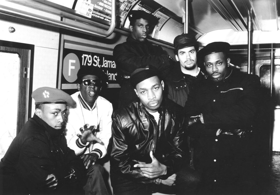 The original members of Public Enemy pose in a New York City subway car.