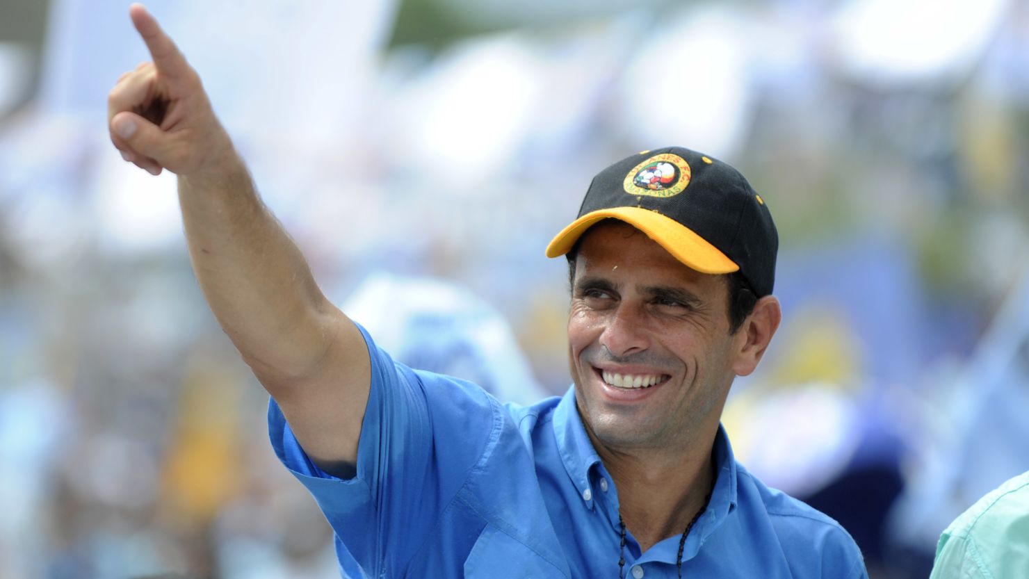 Venezuelan opposition leader Henrique Capriles Radonski gestures during a campaign rally on October 1.