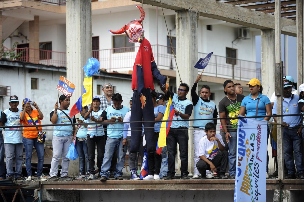 Capriles supporters attend a campaign rally in Puerto Ayacucho on Monday.