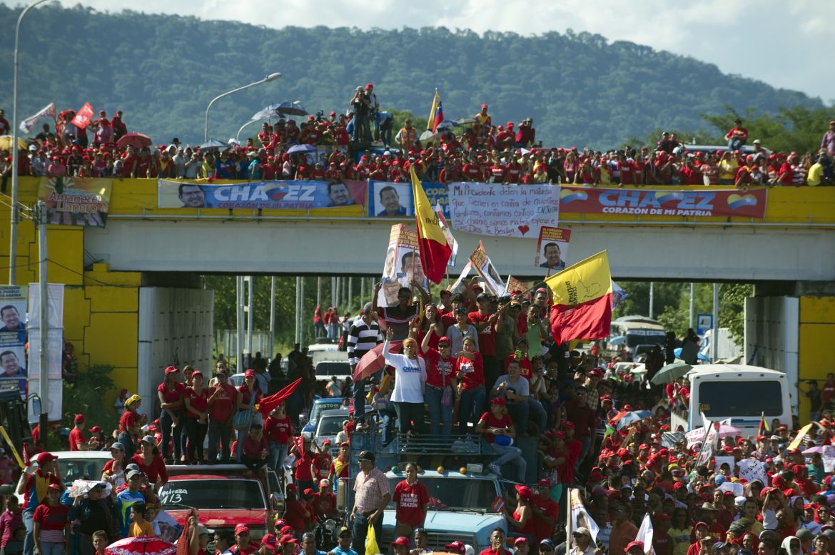 Chavez supporters attend a campaign rally in Boconoito on Monday.