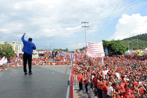 Chavez waves to supporters on Tuesday.