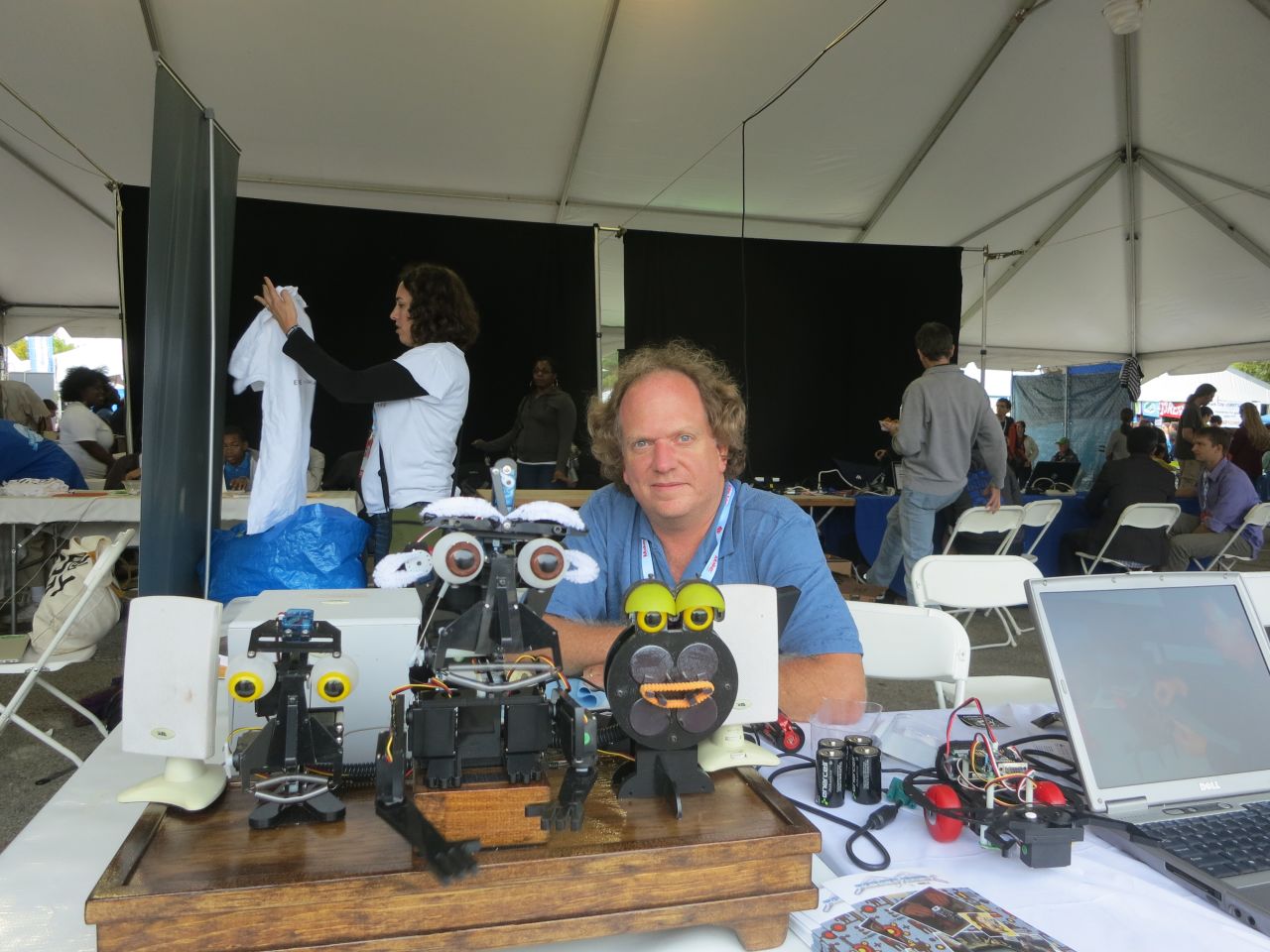 Brian Patton from Trenton, New Jersey brought a singing robot to the recent Maker Faire in New York. With eyebrows made from pipe cleaners and eye's borrowed from a doll, the robot is synched to a computer program that Patton devised and allows him to control facial expressions.