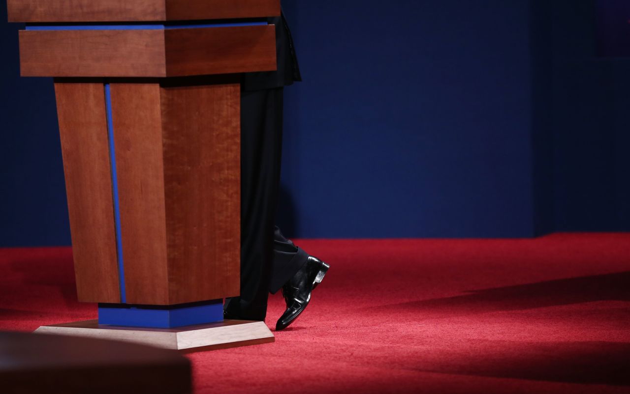 Obama stands at the podium as he speaks during the debate on Wednesday.