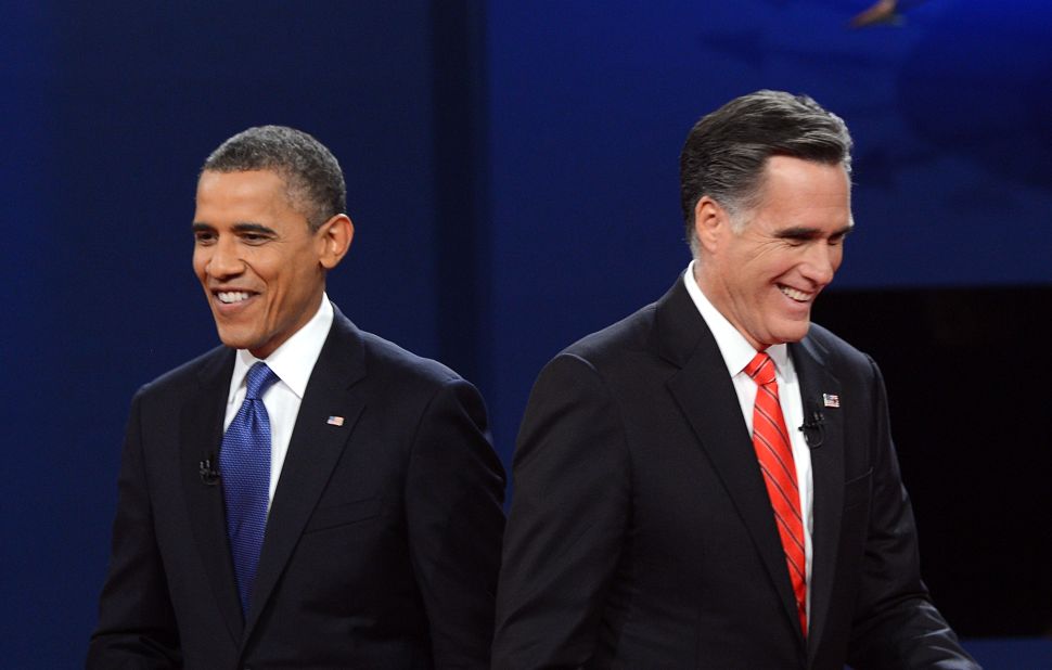 President Barack Obama and Republican presidential candidate Mitt Romney finish their debate in Denver on Wednesday, October 3. <a href="http://www.cnn.com/2012/10/03/politics/gallery/10-3-debate-prep/index.html">View behind-the-scene photos of debate preparations.</a>