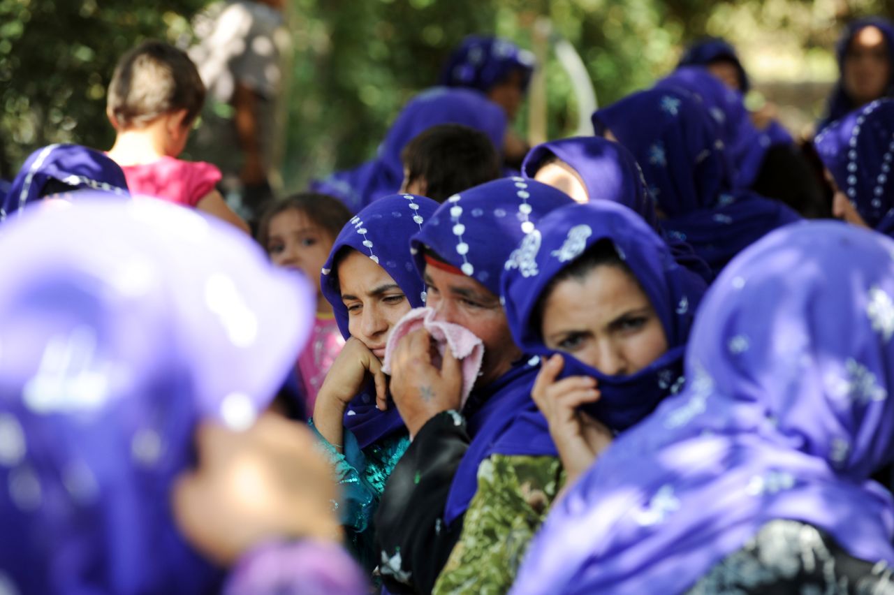 Local women mourn the Turkish civilians on Thursday.