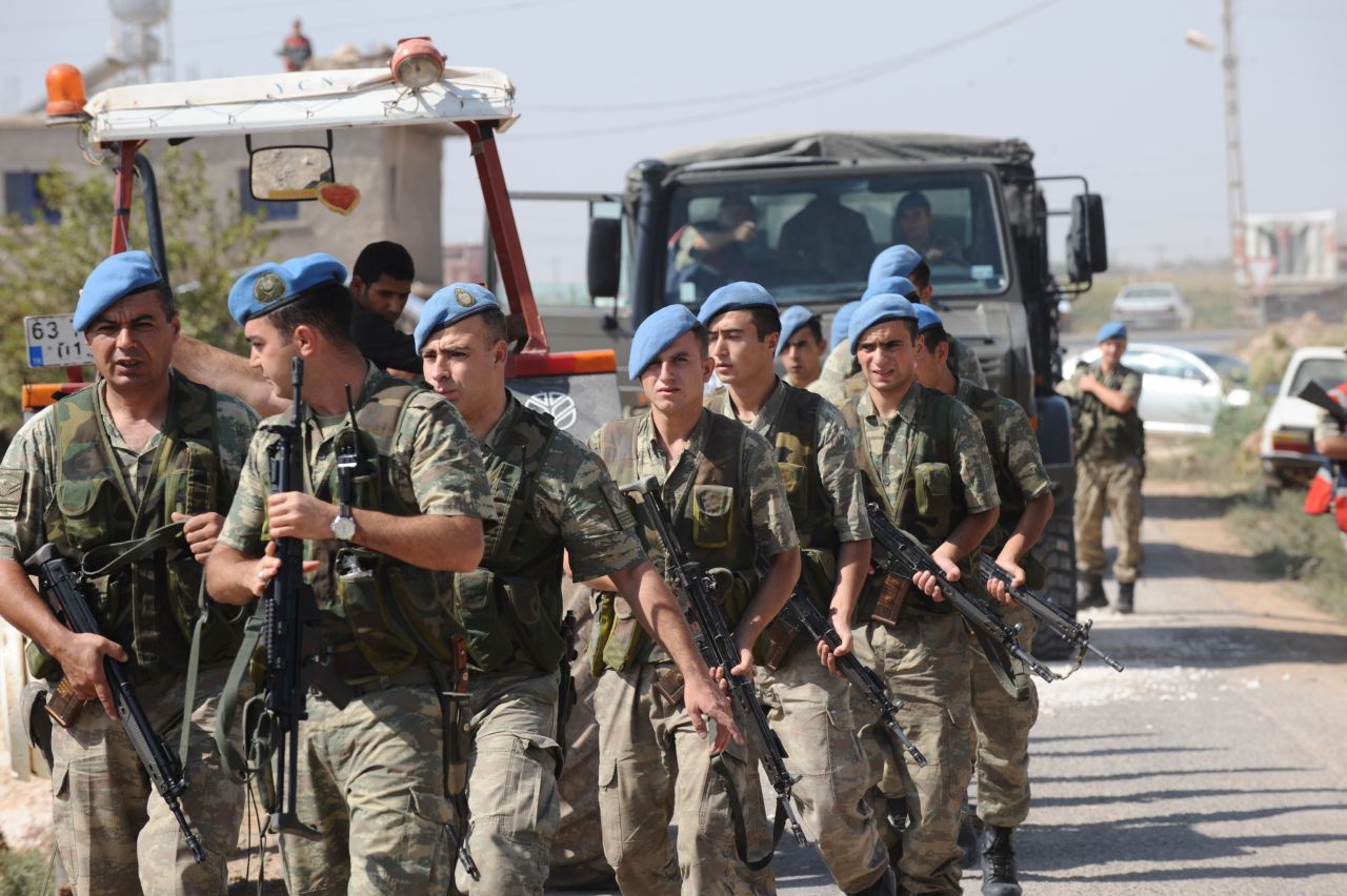 Turkish soldiers march in Akcakale on Thursday.