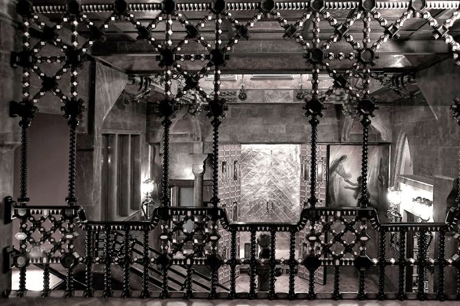 A view from the mezzanine floor behind the beautiful railing made of rosewood with inlaid patterns of ebony. This was one the balconies where the orchestra played during the many concerts organised in the palace. Below metal-plated doors are open to an in-built altar for religious ceremonies. © Diego Ferrari/Grand Tour Magazine