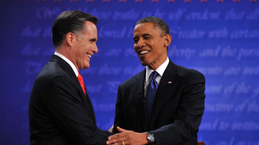 US President Barack Obama (R) and Republican challenger Mitt Romney shake hands following their first debate at the University of Denver in Denver, Colorado, October 3, 2012. After hundreds of campaign stops, $500 million in mostly negative ads and countless tit-for-tat attacks, Obama and Romney went head-to-head in their debut debate. AFP PHOTO / Nicholas KAMM (Photo credit should read NICHOLAS KAMM/AFP/GettyImages)