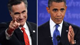 US President Barack Obama (R) speaks during his debate with Republican Presidential candidate Mitt Romney (L), who greets the audience at the conclusion in Denver, Colorado, on October 3, 2012. AFP PHOTO / Nicholas KAMM (R)/SAUL LOEB (L) (Photo credit should read STF/AFP/GettyImages) 