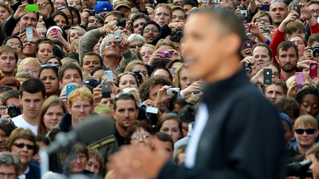 Obama addresses the crowd at the University of Wisconsin in Madison on Thursday.