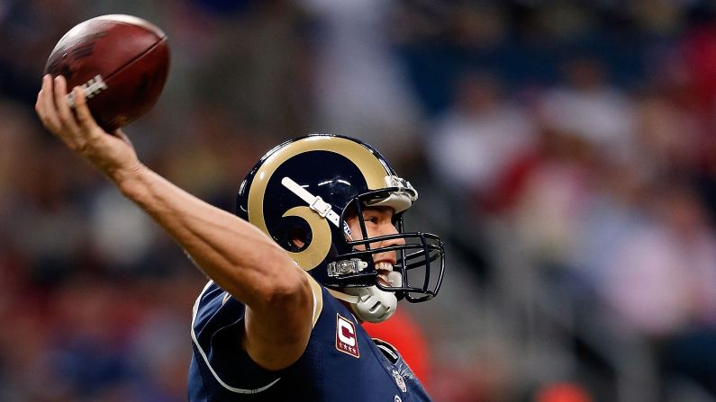 Quarterback Sam Bradford of the St. Louis Rams fires a pass off Thursday against the Arizona Cardinals.