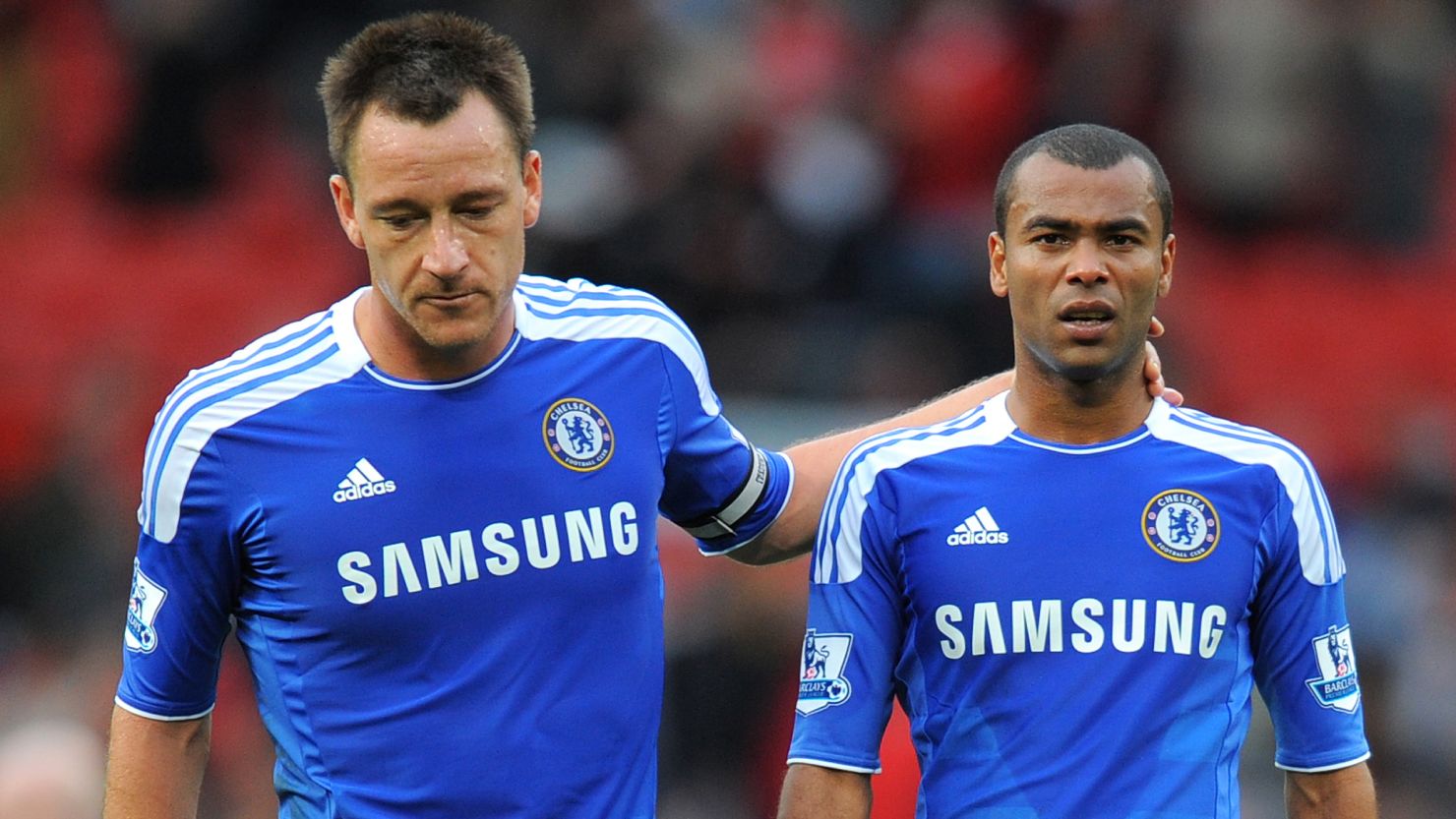 Ashley Cole (right) may incur an FA sanction after his outburst in response to a report which highlighted 'inconsistencies' in the evidence he gave in support of Chelsea team mate John Terry (left) following his racial comments towards Anton Ferdinand last year