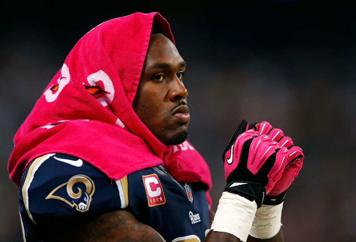 Steven Jackson of the St. Louis Rams watches Thursday's game against the Arizona Cardinals from the sidelines at the Edward Jones Dome.
