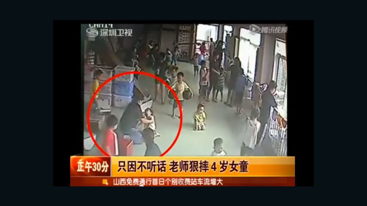 Video grab taken from Chinese news report posted on YouTube purportedly shows girl being manhandled.