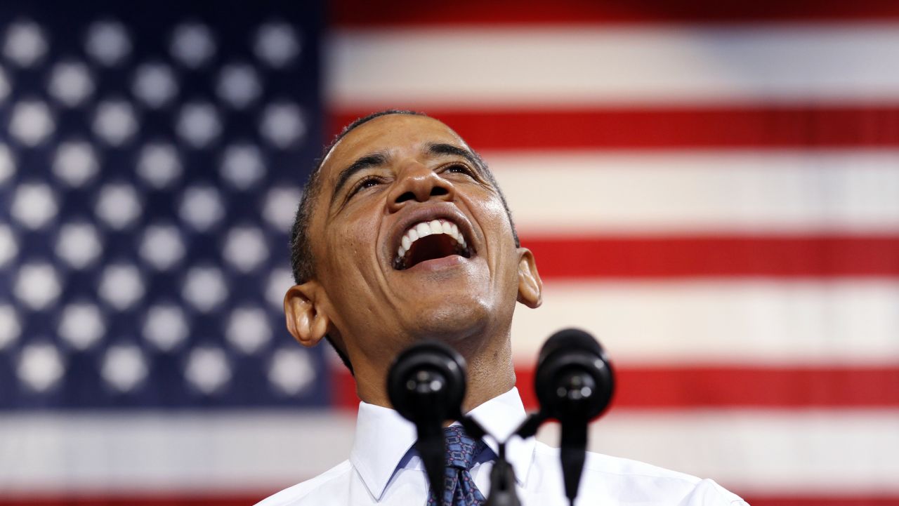 Obama smiles as he speaks during a campaign rally in Fairfax, Virginia on Friday.