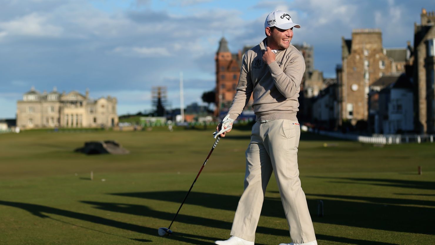 Branden Grace shares a joke before teeing off on the 18th at St Andrews which he birdied for a 67.