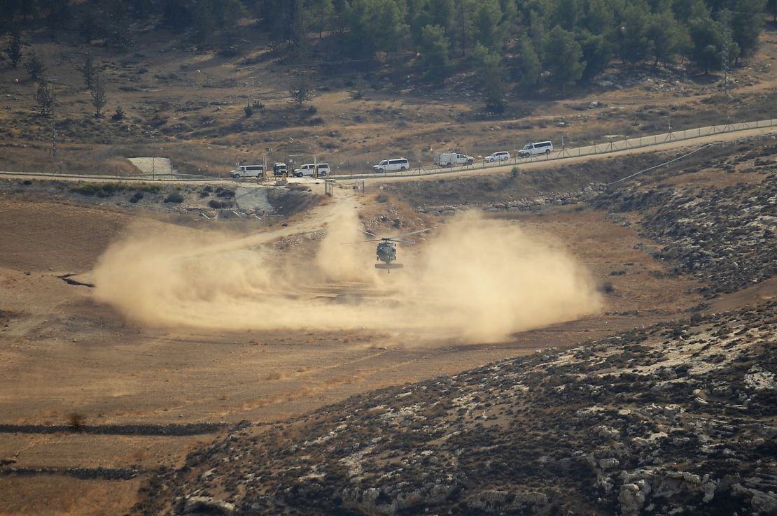 An Israeli army helicopter searches for the remains of the downed drone in the northern Negev.  