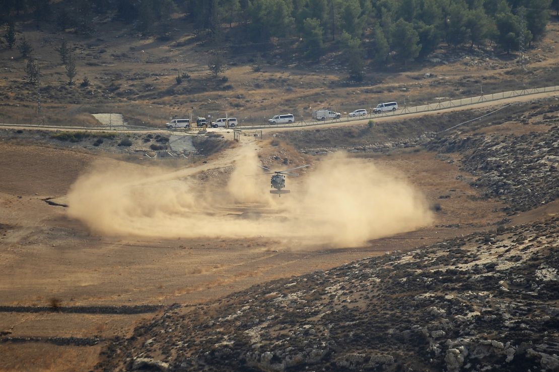 An Israeli army helicopter searches for the remains of the downed drone in the northern Negev.
