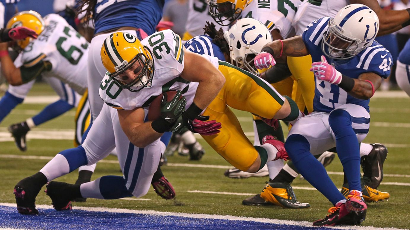 John Kuhn of the Green Bay Packers scores a touchdown Sunday against the Indianapolis Colts.